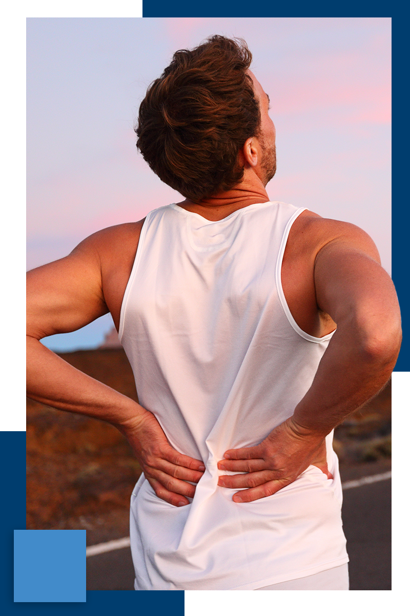 man running outside, stopped to address a hurt back