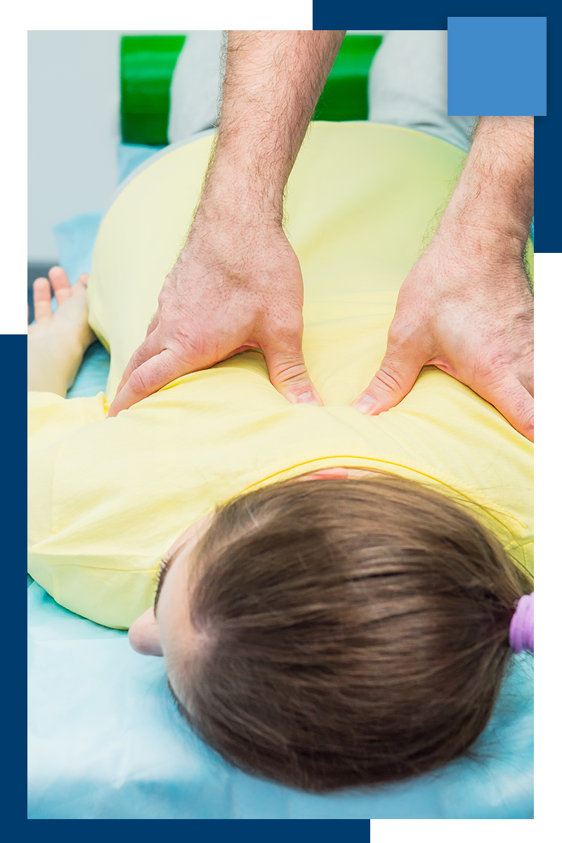 pressing on patient's back, massage