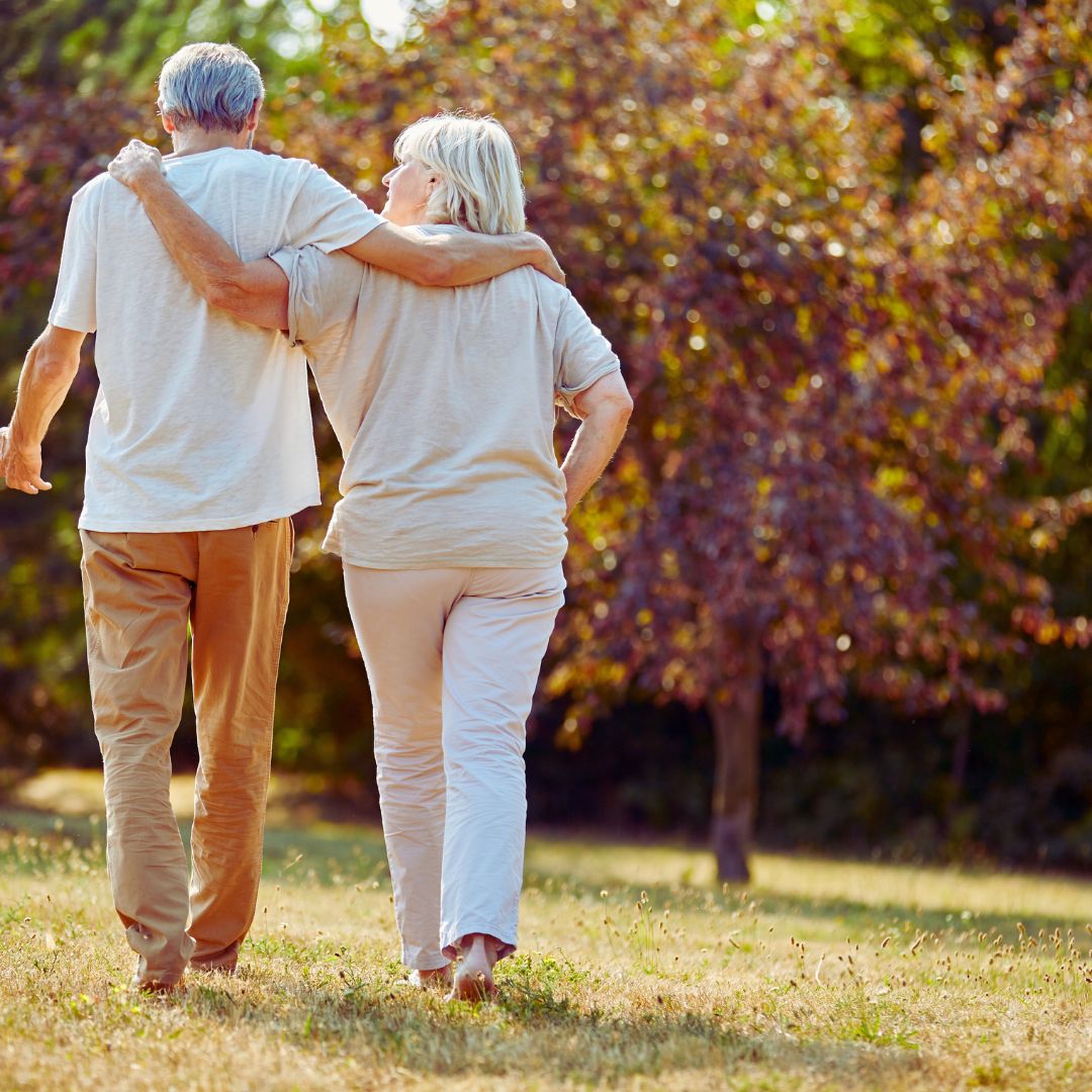 mature couple walking outside