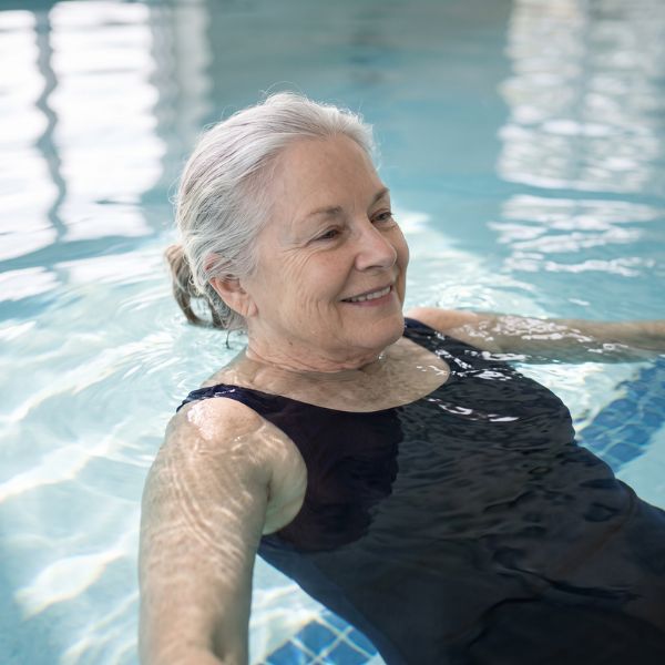 woman swimming in pool