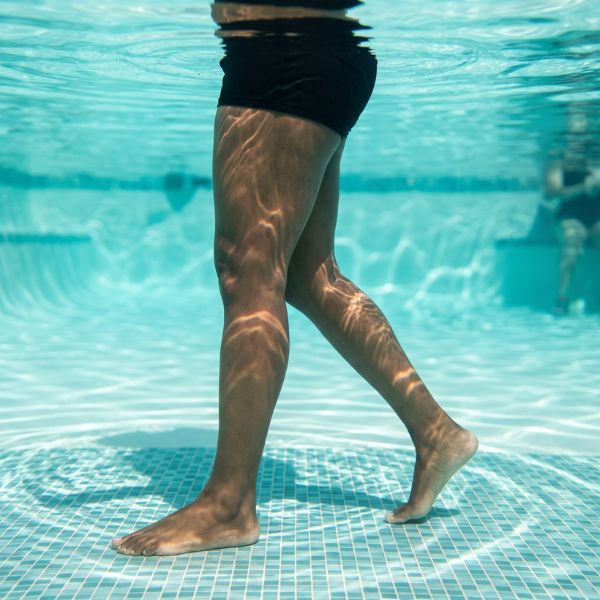 woman walking in pool